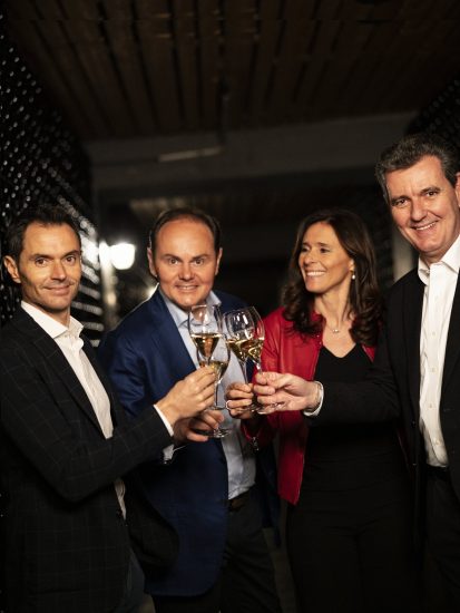 La famiglia Lunelli, fotografata nelle cantine Ferrari di Trento, proprietà del Gruppo Lunelli. © Andrea Frazzetta