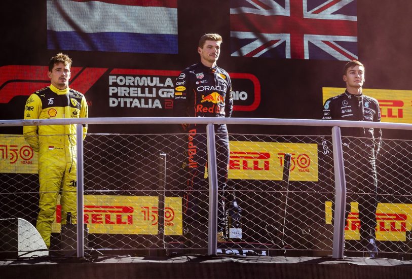 MONZA - (VLNR) Charles Leclerc (Ferrari), Max Verstappen (Oracle Red Bull Racing) and George Russell (Mercedes) on the podium after the F1 Grand Prix of Italy at the Monza Circuit in Monza, Italy. REMKO DE WAAL (Photo by ANP via Getty Images)
