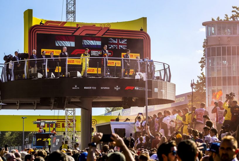 MONZA - (VLNR) Charles Leclerc (Ferrari), Max Verstappen (Oracle Red Bull Racing) and George Russell (Mercedes) on the podium after the F1 Grand Prix of Italy at the Monza Circuit in Monza, Italy. REMKO DE WAAL (Photo by ANP via Getty Images)