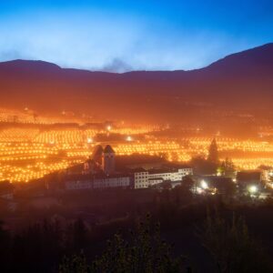 Vineyards light up with candles again against frost. In South Tyrol, at Abbazia di Novacella