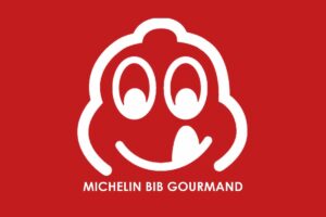 Aspettando le celeberrime stelle, la “Guida Michelin Italia” 2026 svela i nuovi “Bib Gourmand”