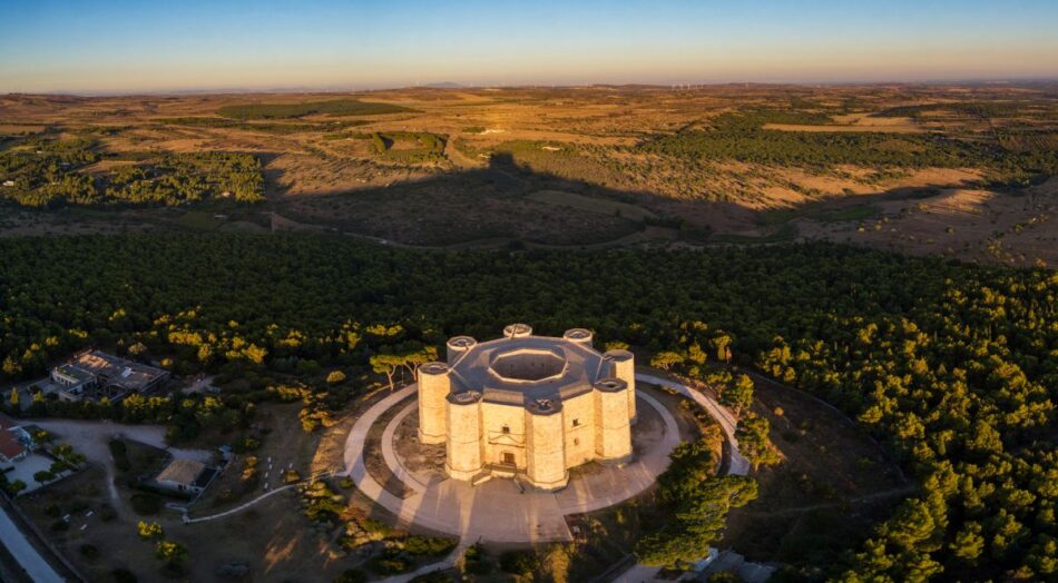 Aerial panoramic view of Castel del Monte, the famous castle built in an octagonal shape by the Holy Roman Emperor Frederick II in the 13th century in Apulia, Italy. World Heritage Site since 1996.